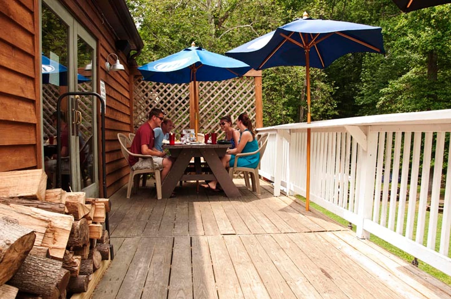 the deck out back, umbrellas up